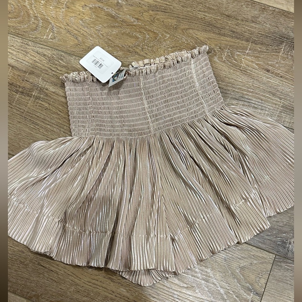 Queen of Sparkles champagne metallic swing shorts. Size small. NWT $40.
